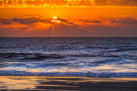 A Partial Solar Eclipse at sunrise on Ocracoke Island, NC