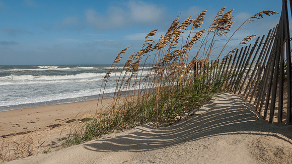 Its the end of summer, the days are getting shorter, the sea oats are a golden color, and the waves are bigger.  The summer crush of visitors are gone - its a beautiful time to be on the beach.