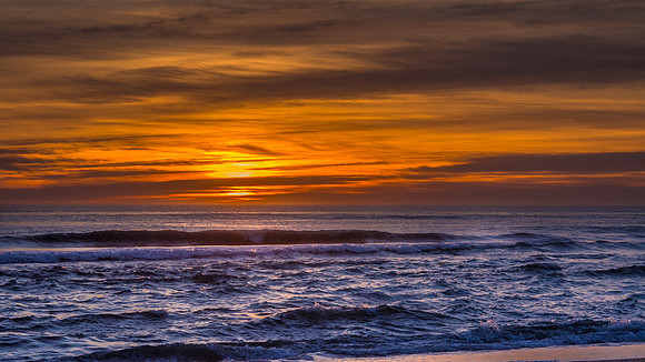 Veiled sunrise in Duck, NC