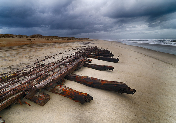Strong timbers, all that remain of a wooden schooner, Hatteras Beach, NC